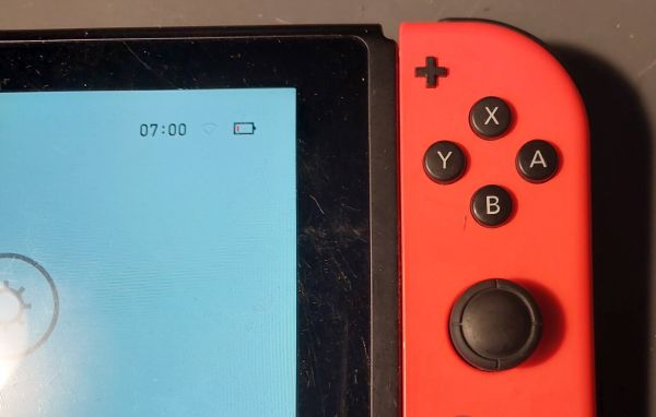 Nintendo Switch Joy-Con ZR pogas remonts Rīgā